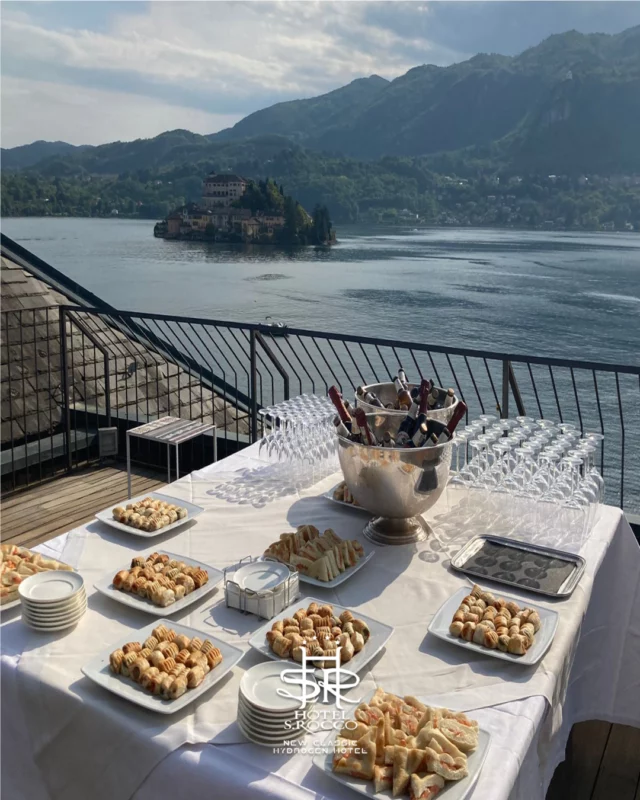 🌿 Momenti da celebrare, in un luogo speciale.Al San Rocco, ogni dettaglio è pensato per rendere indimenticabili eventi riservati e occasioni da vivere con eleganza.La nostra terrazza panoramica, affacciata sull’Isola di San Giulio, diventa lo sfondo perfetto per un aperitivo esclusivo: buffet curato, bollicine pronte da stappare 🥂 e l’atmosfera magica del Lago d’Orta 🌅Un’esperienza da vivere. E da ricordare.📍 Hotel San Rocco – Lago d’Orta📞 Info: +39 0322 911977✉️ info@hotelsanrocco.it🌿 Moments to celebrate, in a special place.At San Rocco, every detail is designed to make private events and special occasions truly unforgettable.Our panoramic terrace, overlooking the enchanting Isola di San Giulio, is the perfect setting for an exclusive aperitif: a curated buffet, sparkling wine ready to pour 🥂, and the magical atmosphere of Lake Orta 🌅An experience to enjoy. And to remember.📍 Hotel San Rocco – Lake Orta📞 Info: +39 0322 911977✉️ info@hotelsanrocco.it
